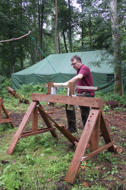 A pole lathe being operated for turning green wood