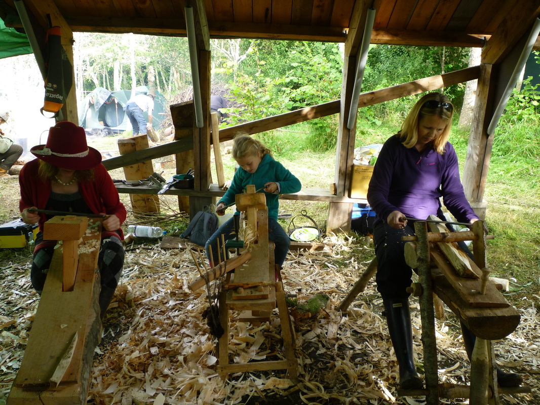 family using shavehorses for green woodworking